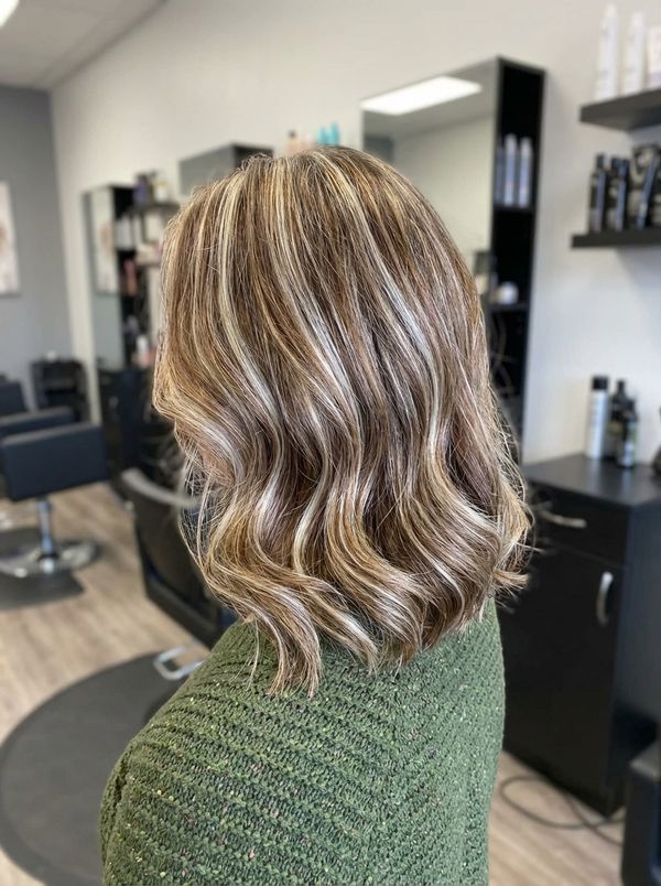 Fresh women's haircut styled at Dynamic Stylz